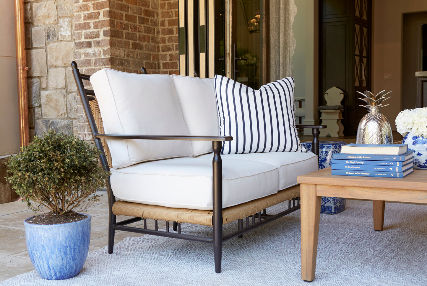 Lloyd Flanders Low Country Loveseat in Natural Finish